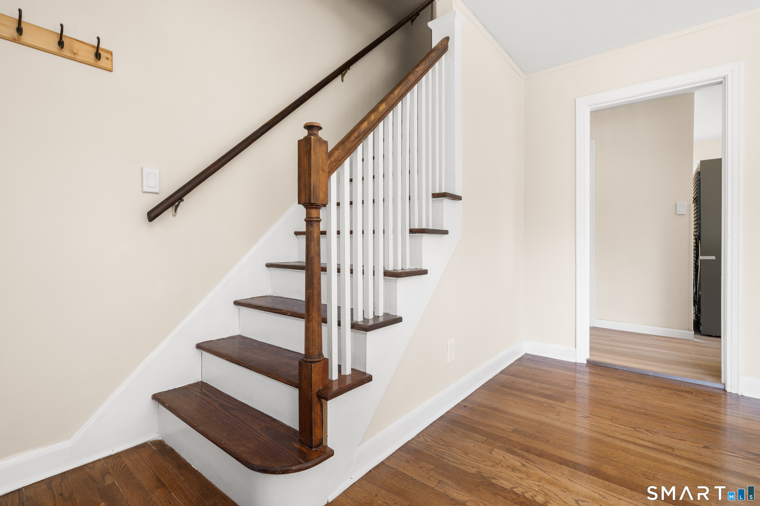 175 Moody Street Bristol, CT 06010 - Photo 9 of 28 a view of entryway with wooden floor