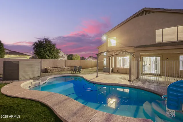 a view of a house with a swimming pool