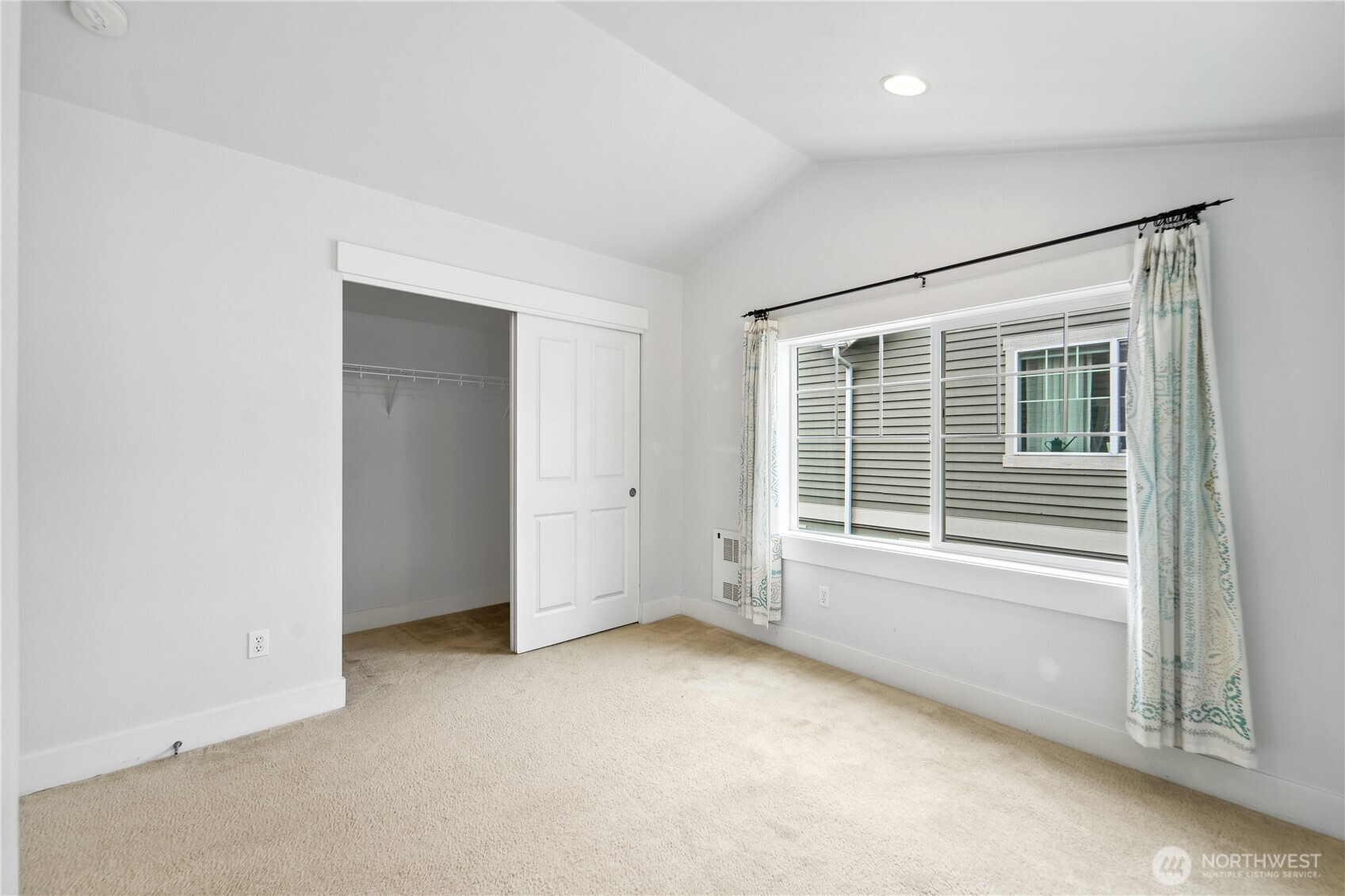 8403 8th Avenue Northwest, Unit B Seattle, WA 98117 - Photo 13 of 16 an empty room with a window