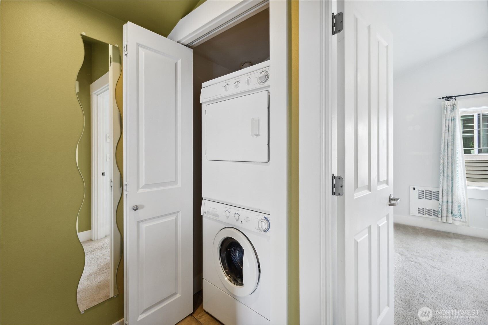 8403 8th Avenue Northwest, Unit B Seattle, WA 98117 - Photo 15 of 16 a view of a hallway with washer and dryer