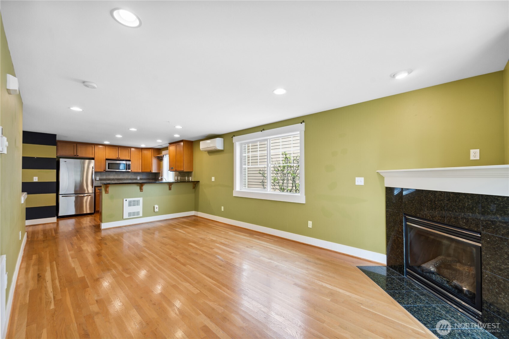 8403 8th Avenue Northwest, Unit B Seattle, WA 98117 - Photo 6 of 16 a view of a livingroom with a fireplace