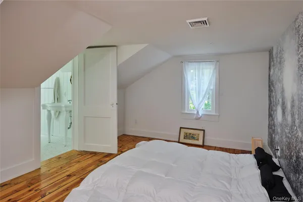 a bathroom with a toilet and shower