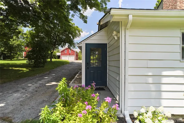 a view of yard with an outdoor space