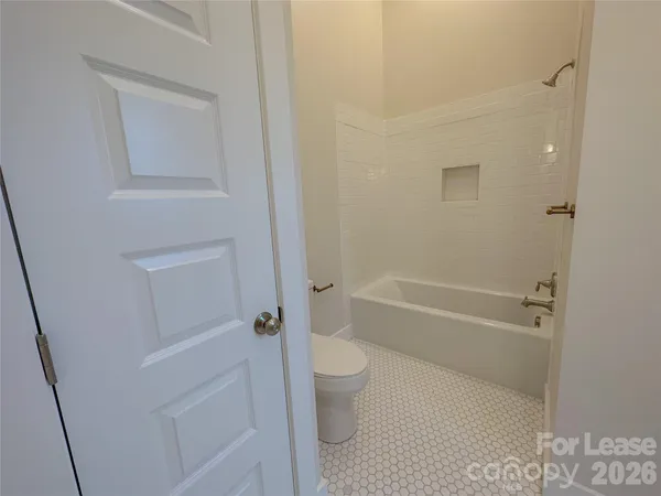 a view of entryway with washer and dryer