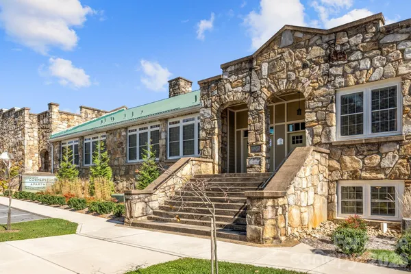 front view of a house with a small yard