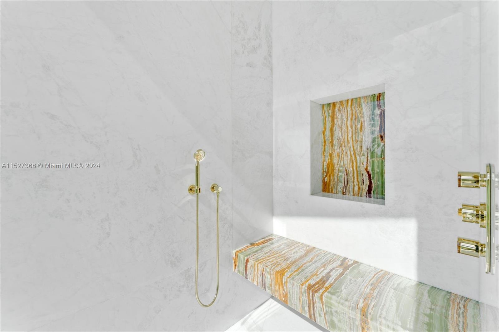 2000 North Bay Road Miami Beach, FL 33140 - Photo 18 of 62 a bed with a bed and a window