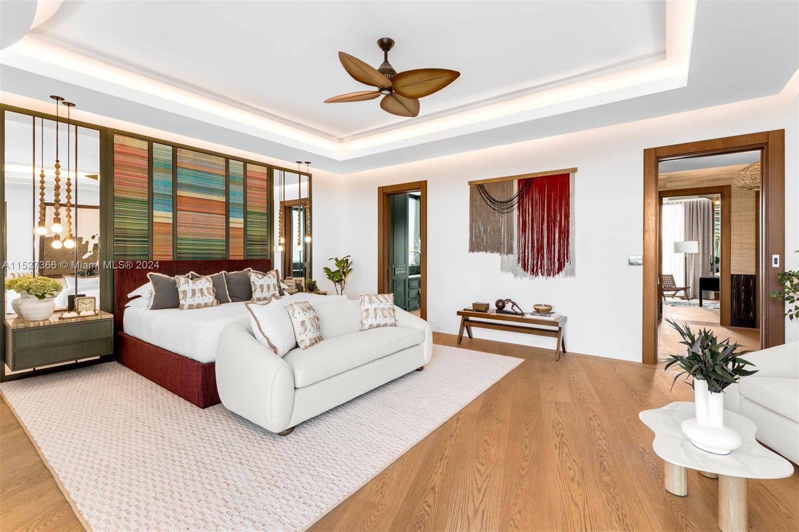 2000 North Bay Road Miami Beach, FL 33140 - Photo 21 of 62 a living room with furniture ceiling fan and a large window