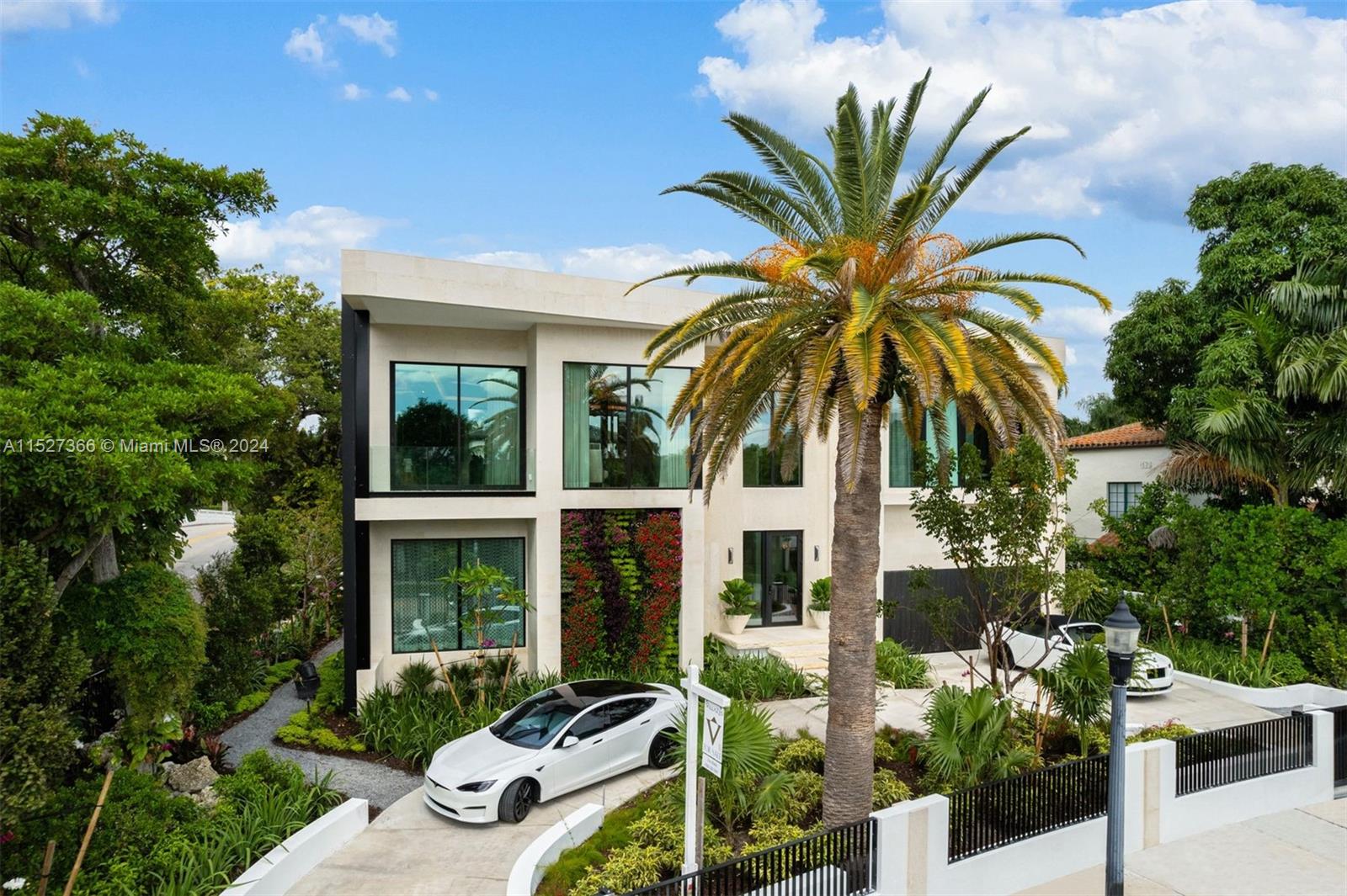 2000 North Bay Road Miami Beach, FL 33140 - Photo 57 of 62 a view of a house with backyard and sitting area