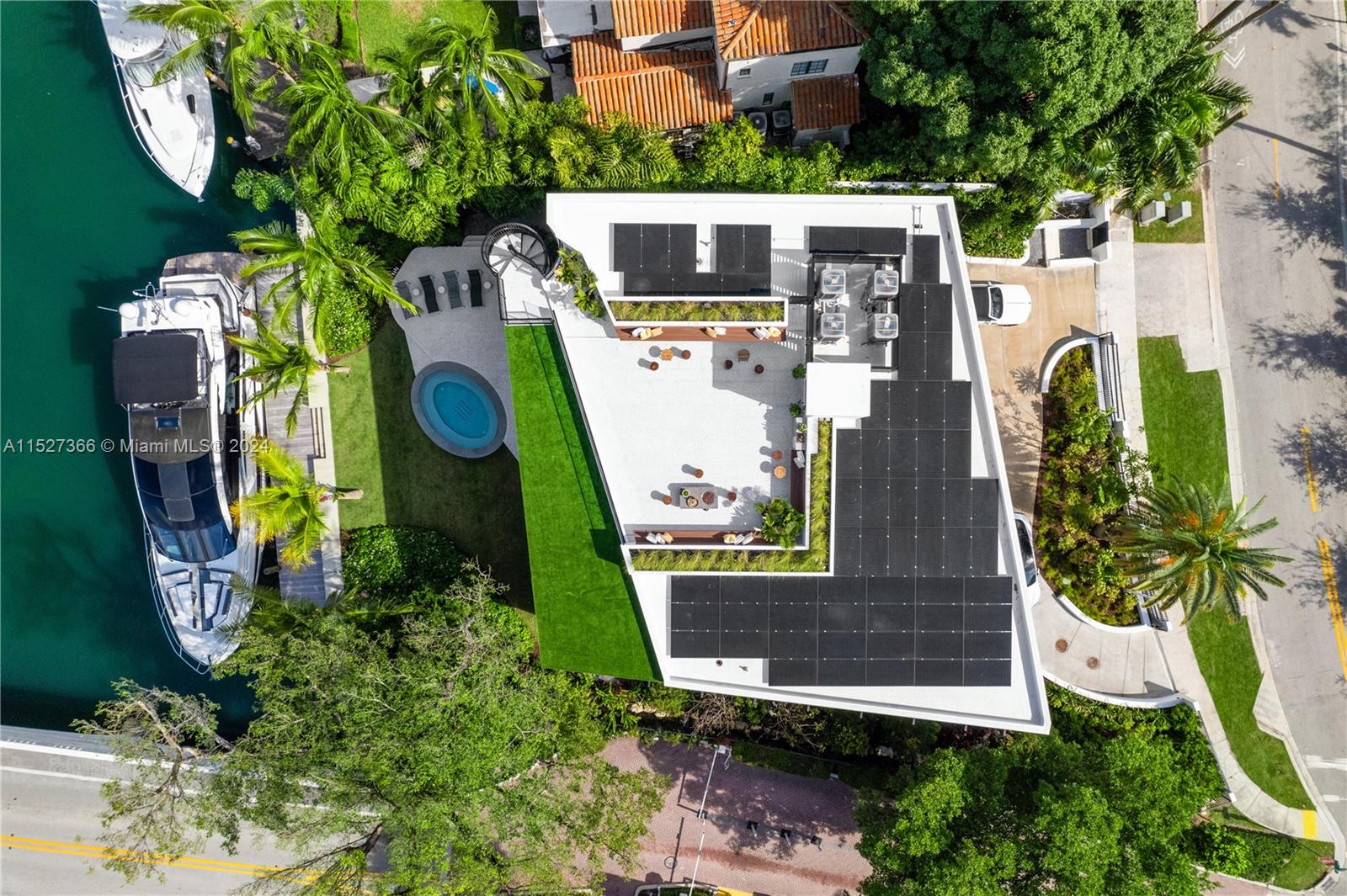 2000 North Bay Road Miami Beach, FL 33140 - Photo 58 of 62 an aerial view of a house with outdoor space
