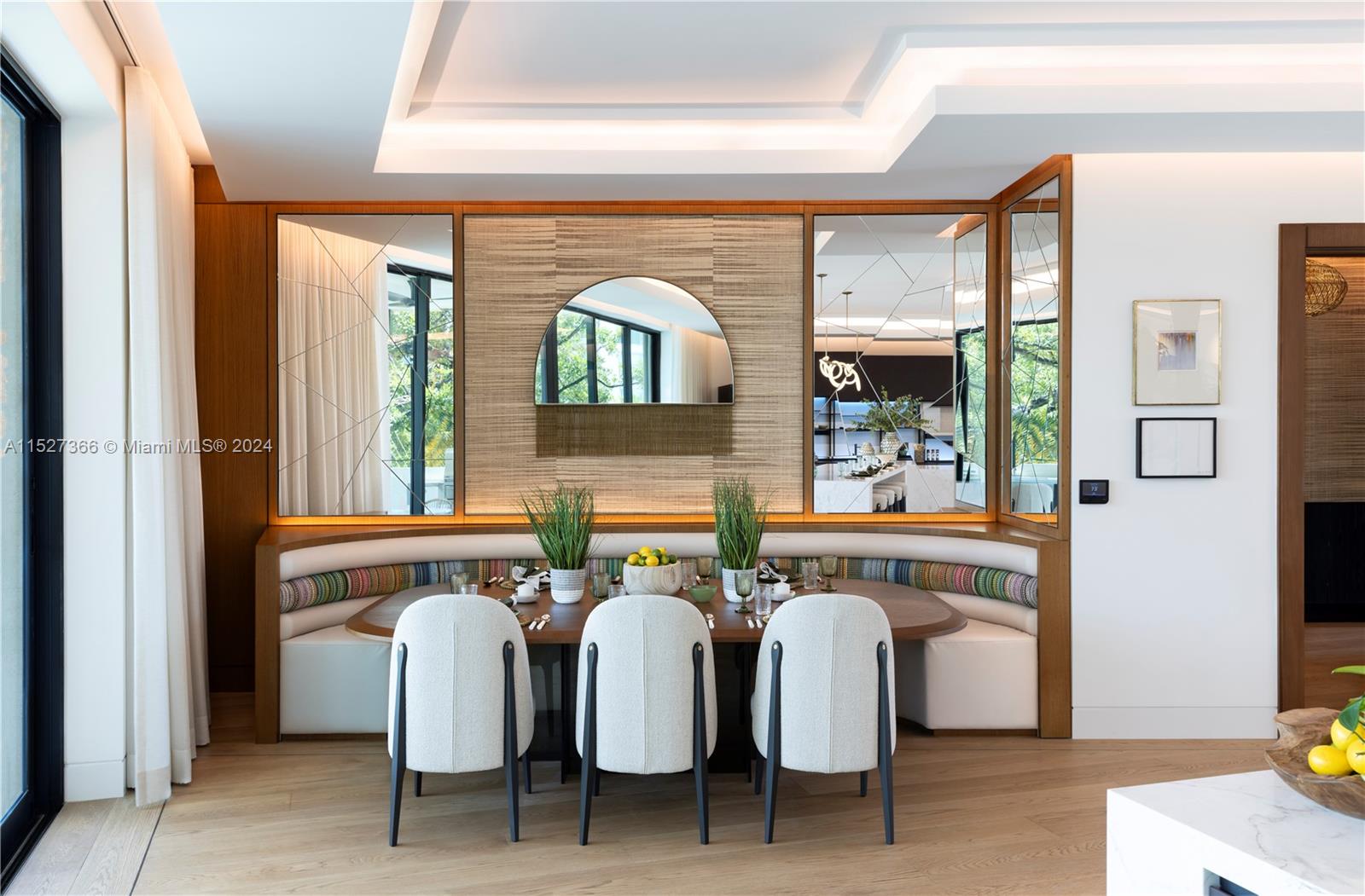 2000 North Bay Road Miami Beach, FL 33140 - Photo 7 of 62 a dining room with furniture and window