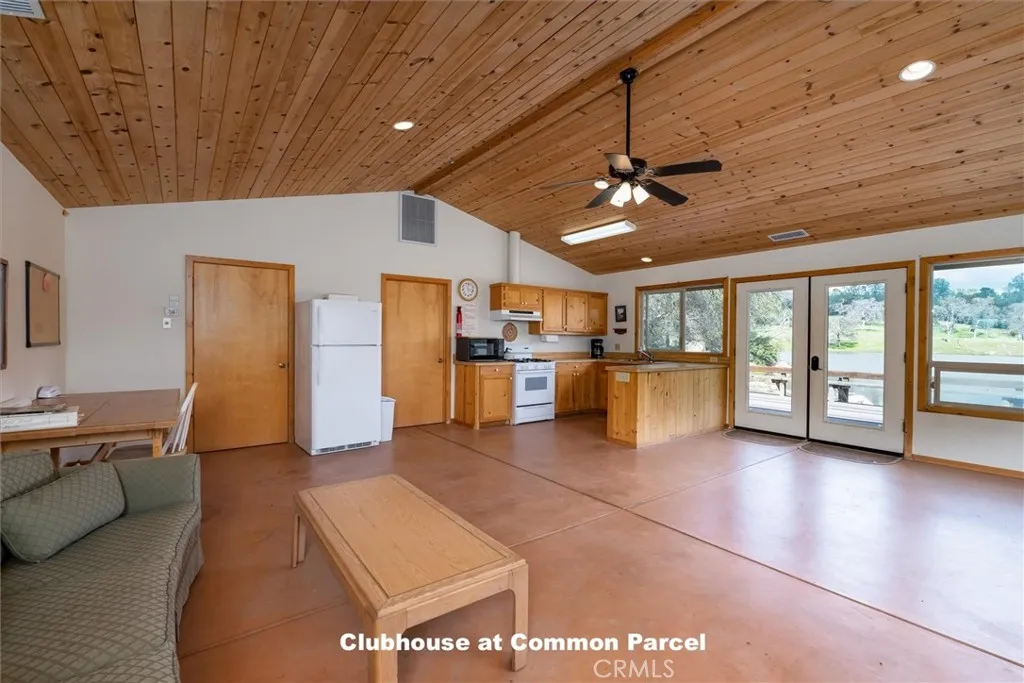 0 Flying O Ranch Road O'Neals, CA 93645 - Photo 22 of 24 a view of a livingroom with furniture and a ceiling fan