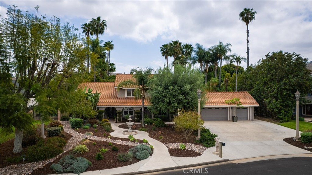 a house view with a garden space