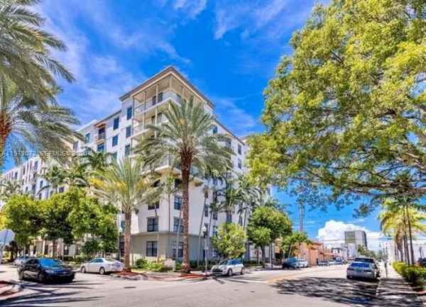 a view of a building with a street