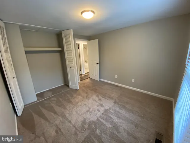 an empty room with a door