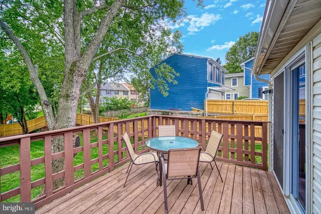 a view of a two chairs in the balcony