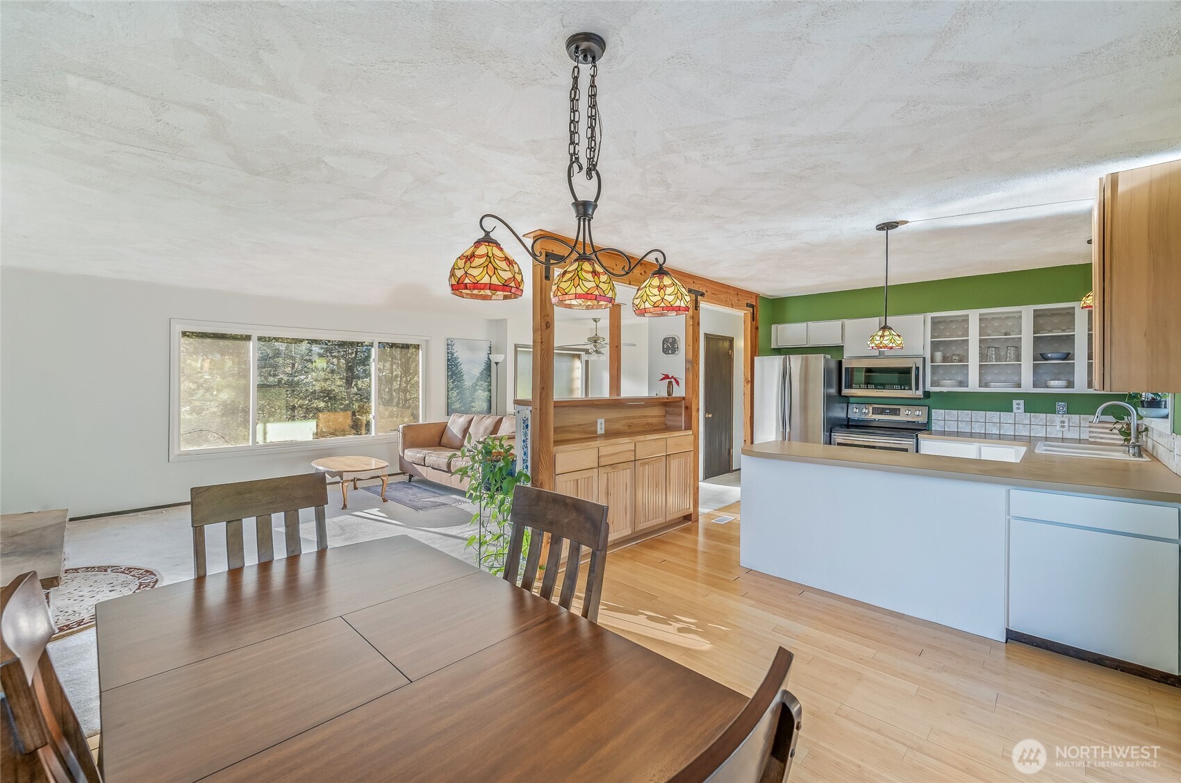 2314 Westwick Road Wenatchee, WA 98801 - Photo 12 of 37 a view of a dining room with furniture window and outside view