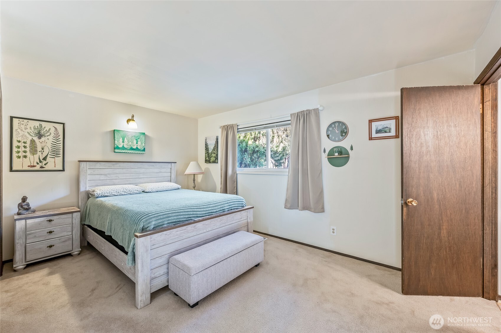 2314 Westwick Road Wenatchee, WA 98801 - Photo 17 of 37 a bedroom with a bed and painting on the wall