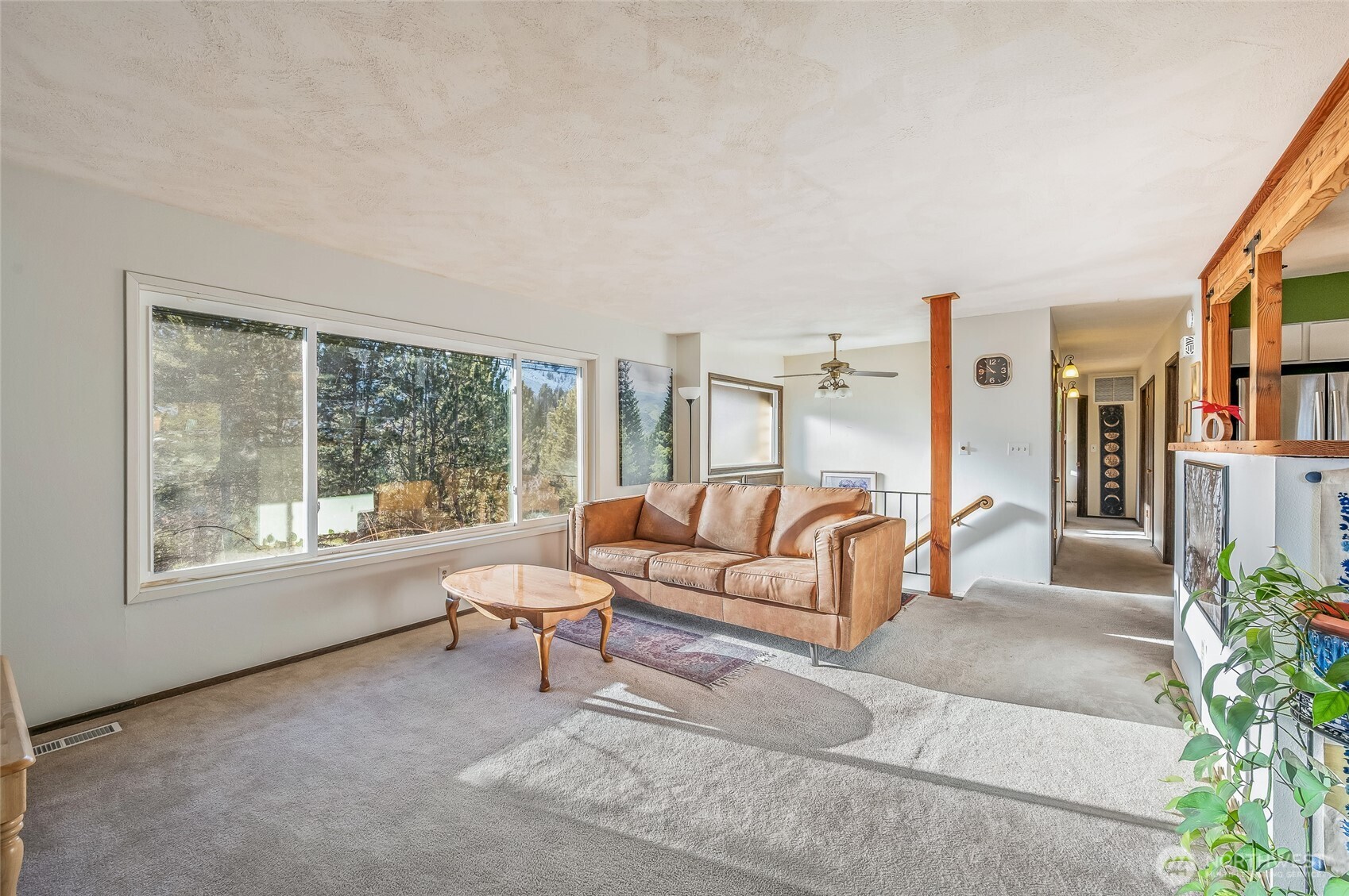2314 Westwick Road Wenatchee, WA 98801 - Photo 5 of 37 a living room with furniture and a potted plant next to a window
