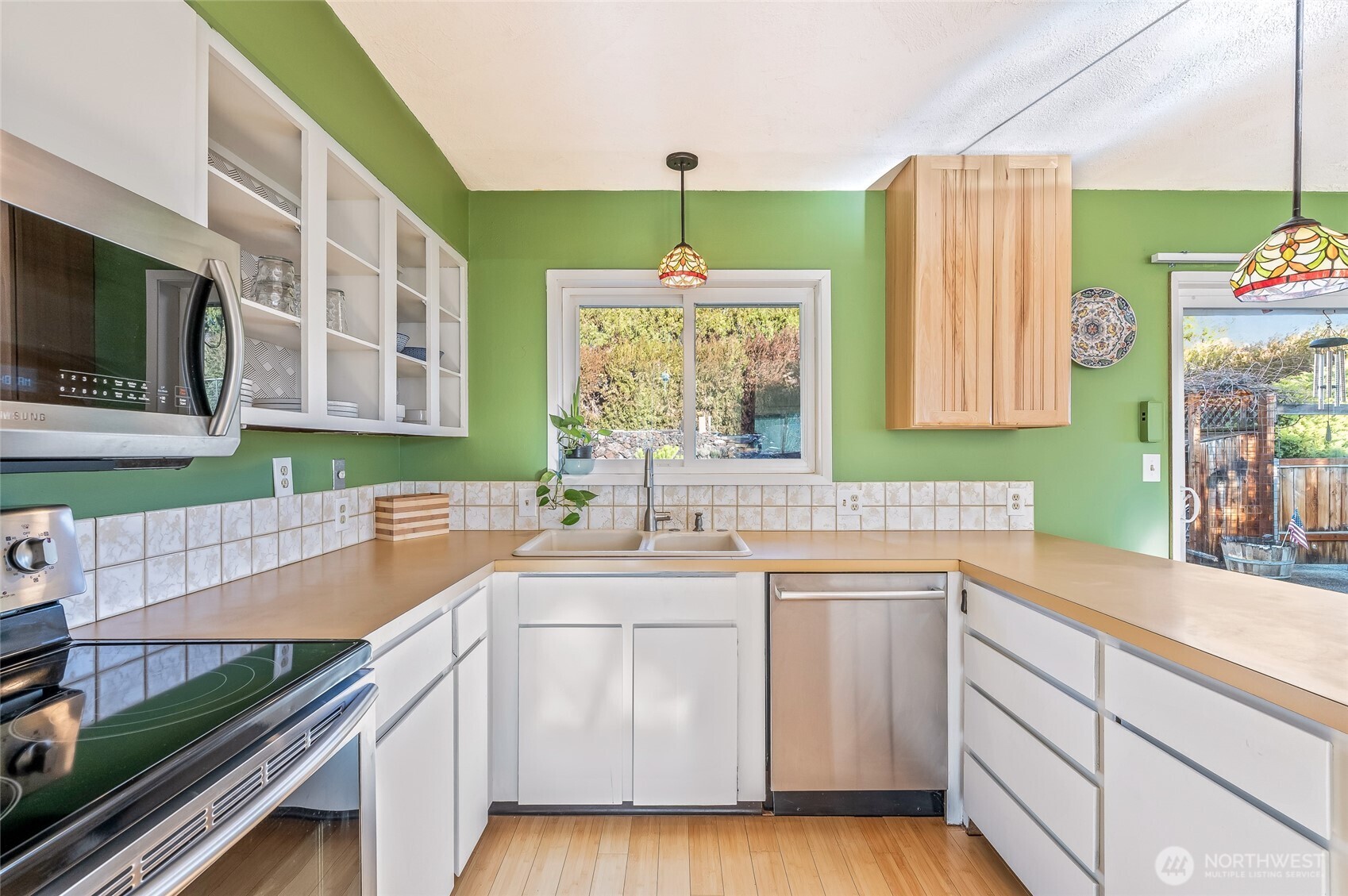 2314 Westwick Road Wenatchee, WA 98801 - Photo 8 of 37 a kitchen with a sink stove and microwave