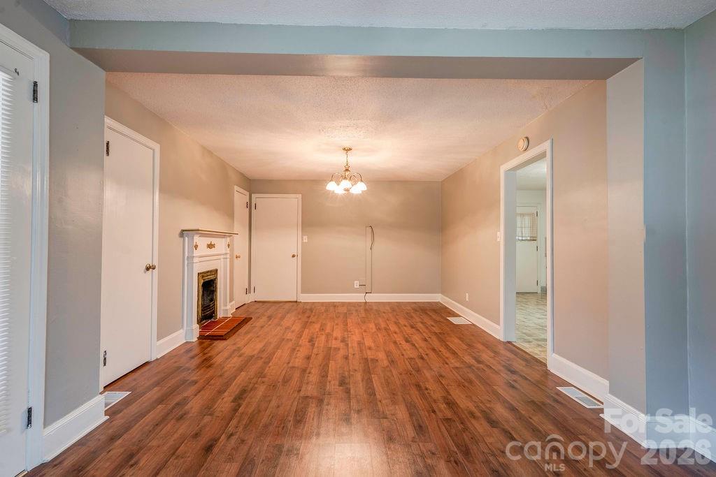 714 Linwood Road Kings Mountain, NC 28086 - Photo 13 of 26 a view of empty room with wooden floor