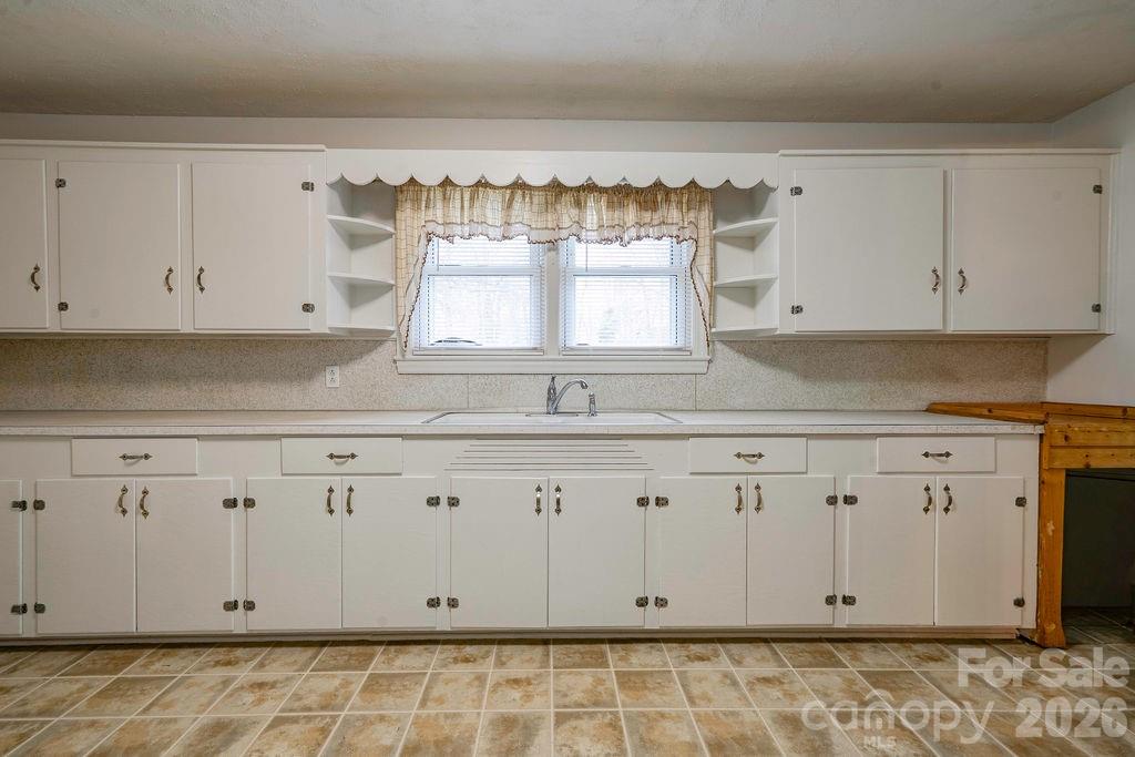714 Linwood Road Kings Mountain, NC 28086 - Photo 15 of 26 a view of granite countertop white cabinets
