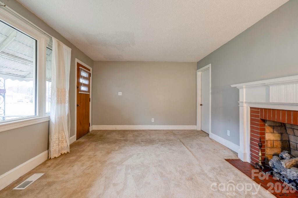 714 Linwood Road Kings Mountain, NC 28086 - Photo 17 of 26 an empty room with windows