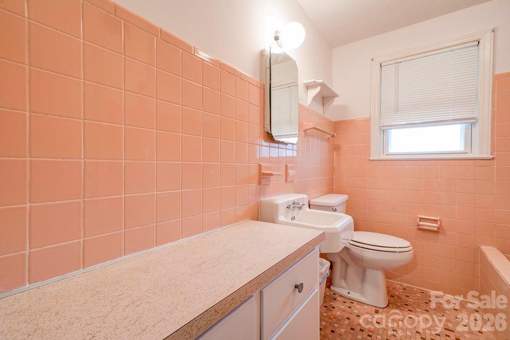 714 Linwood Road Kings Mountain, NC 28086 - Photo 20 of 26 a bathroom with a sink a toilet and a mirror