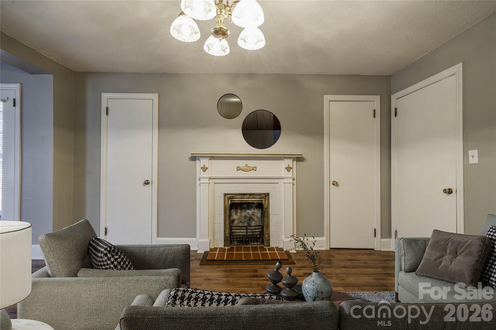 714 Linwood Road Kings Mountain, NC 28086 - Photo 3 of 26 a living room with furniture and a fireplace