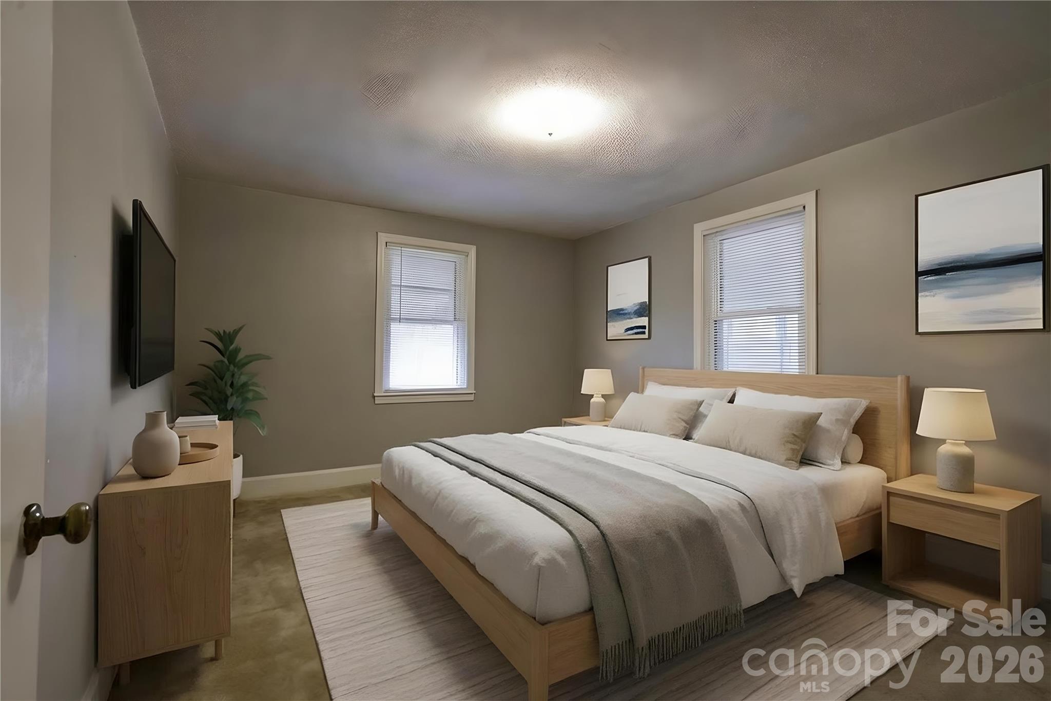 714 Linwood Road Kings Mountain, NC 28086 - Photo 10 of 26 a bedroom with a bed and a potted plant