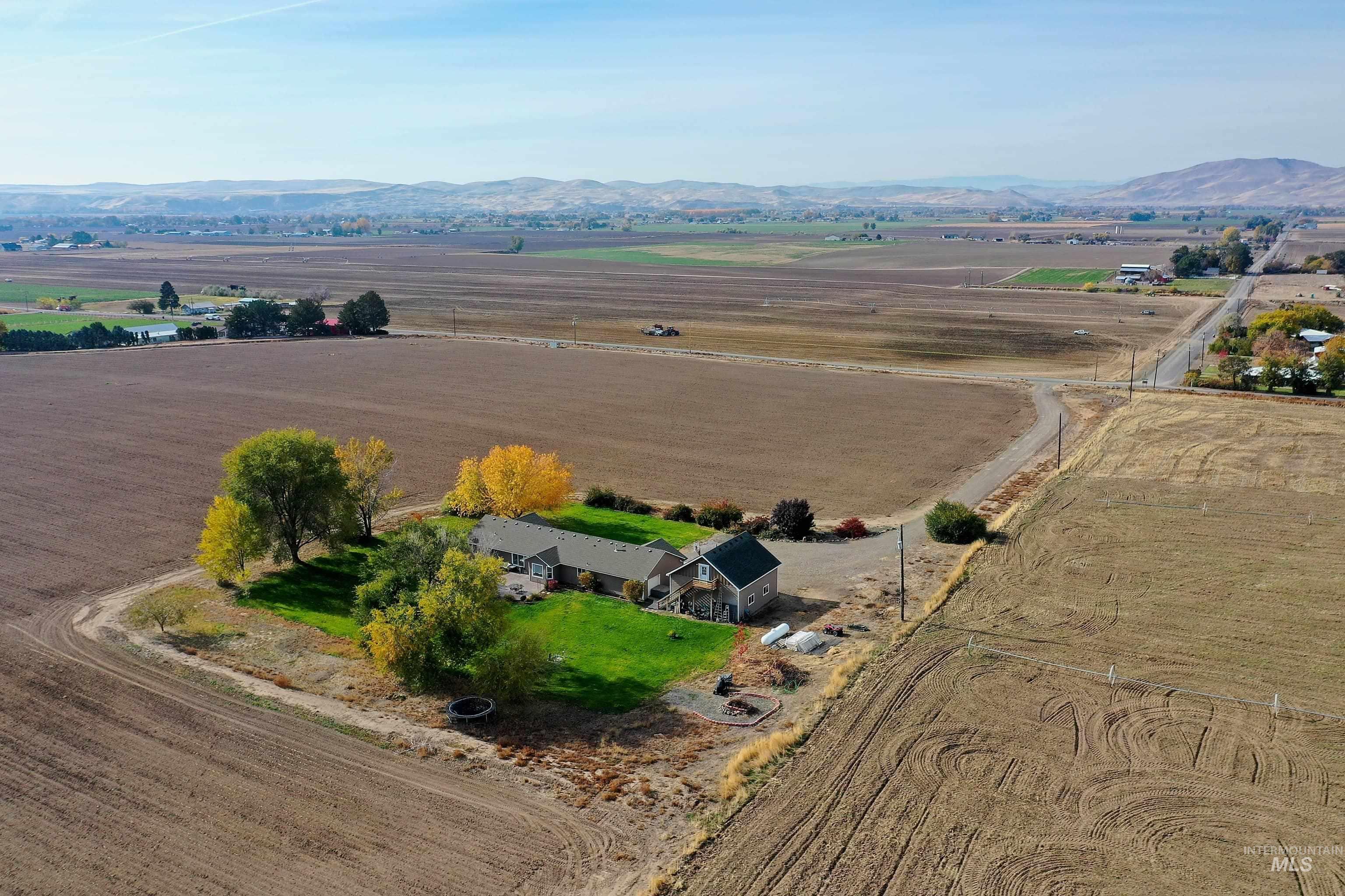 890 Jenkins Creek Road Weiser, ID 83672 - Photo 43 of 45 Aerial overview of property's location featuring rural landscape and a mountainous background