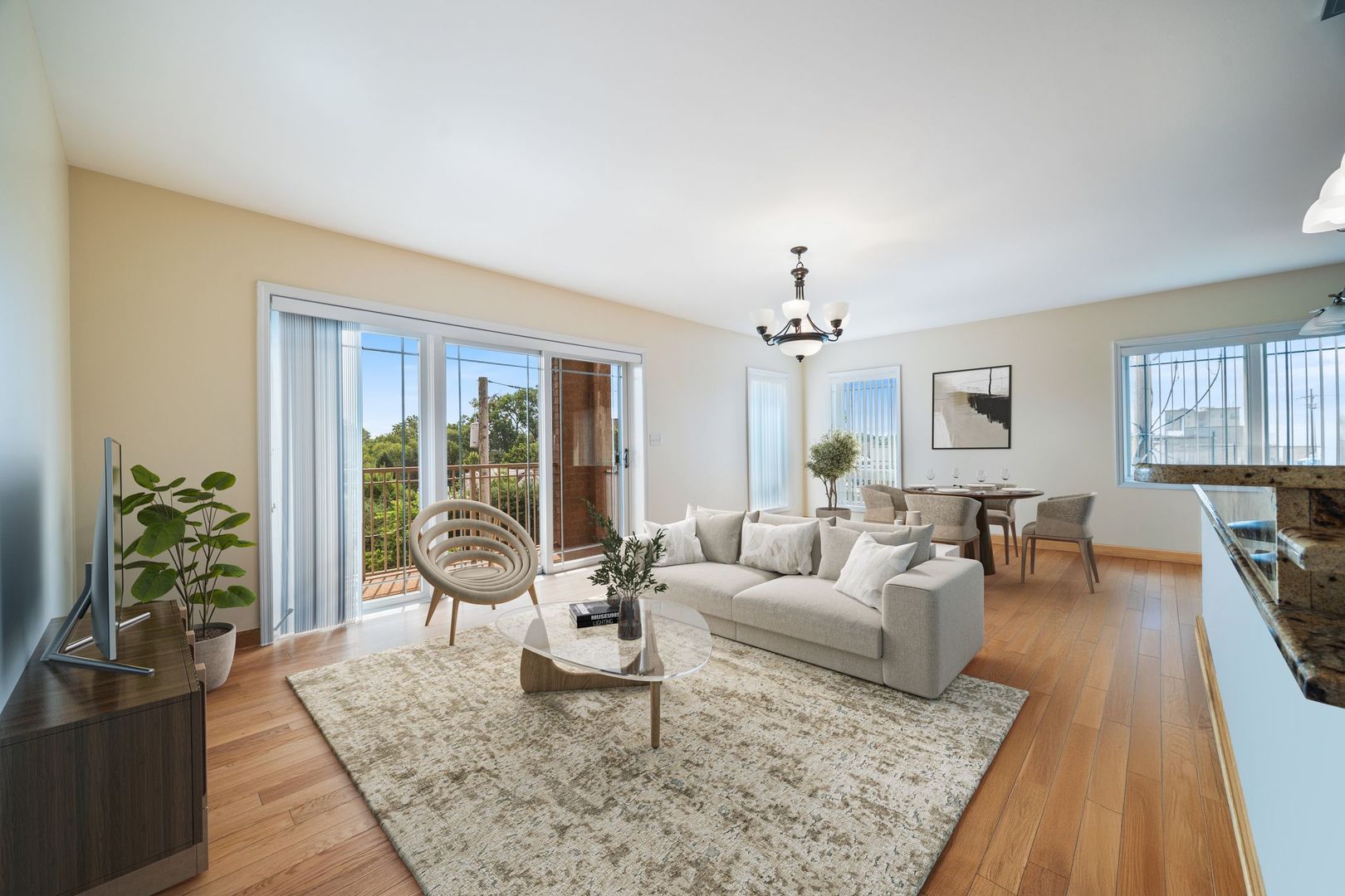 77 North Wolf Road, Unit 309 Northlake, IL 60164 - Photo 3 of 25 a living room with furniture and a chandelier