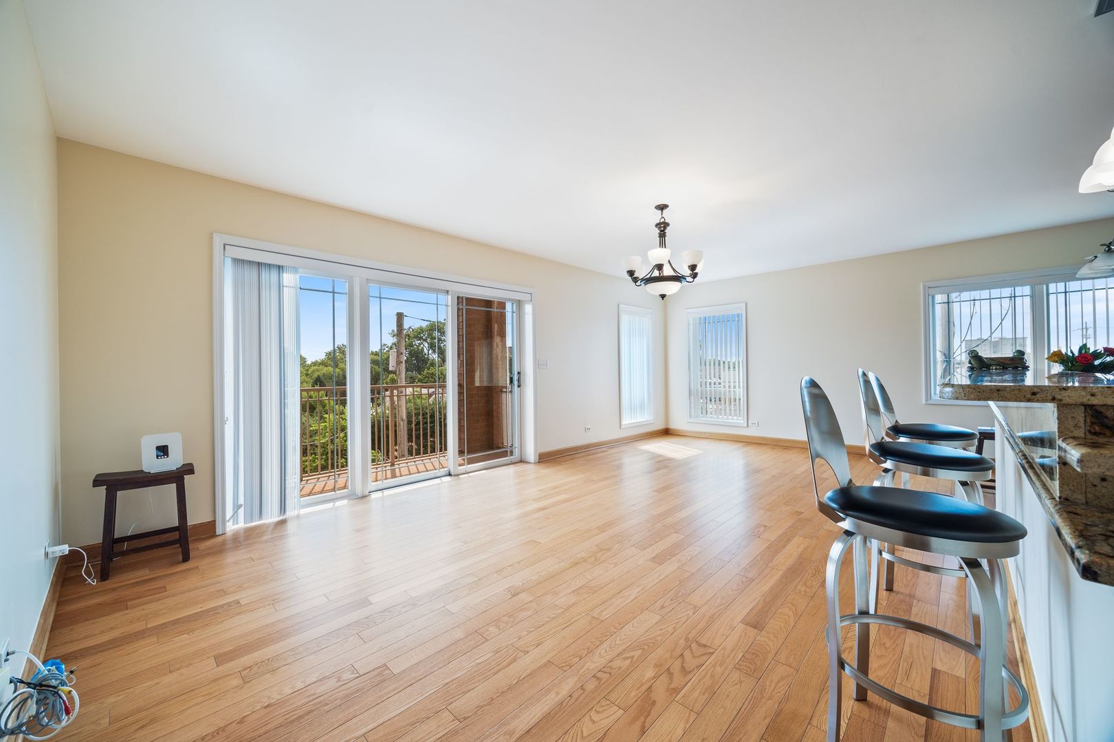 77 North Wolf Road, Unit 309 Northlake, IL 60164 - Photo 4 of 25 a view of a livingroom with furniture and wooden floor