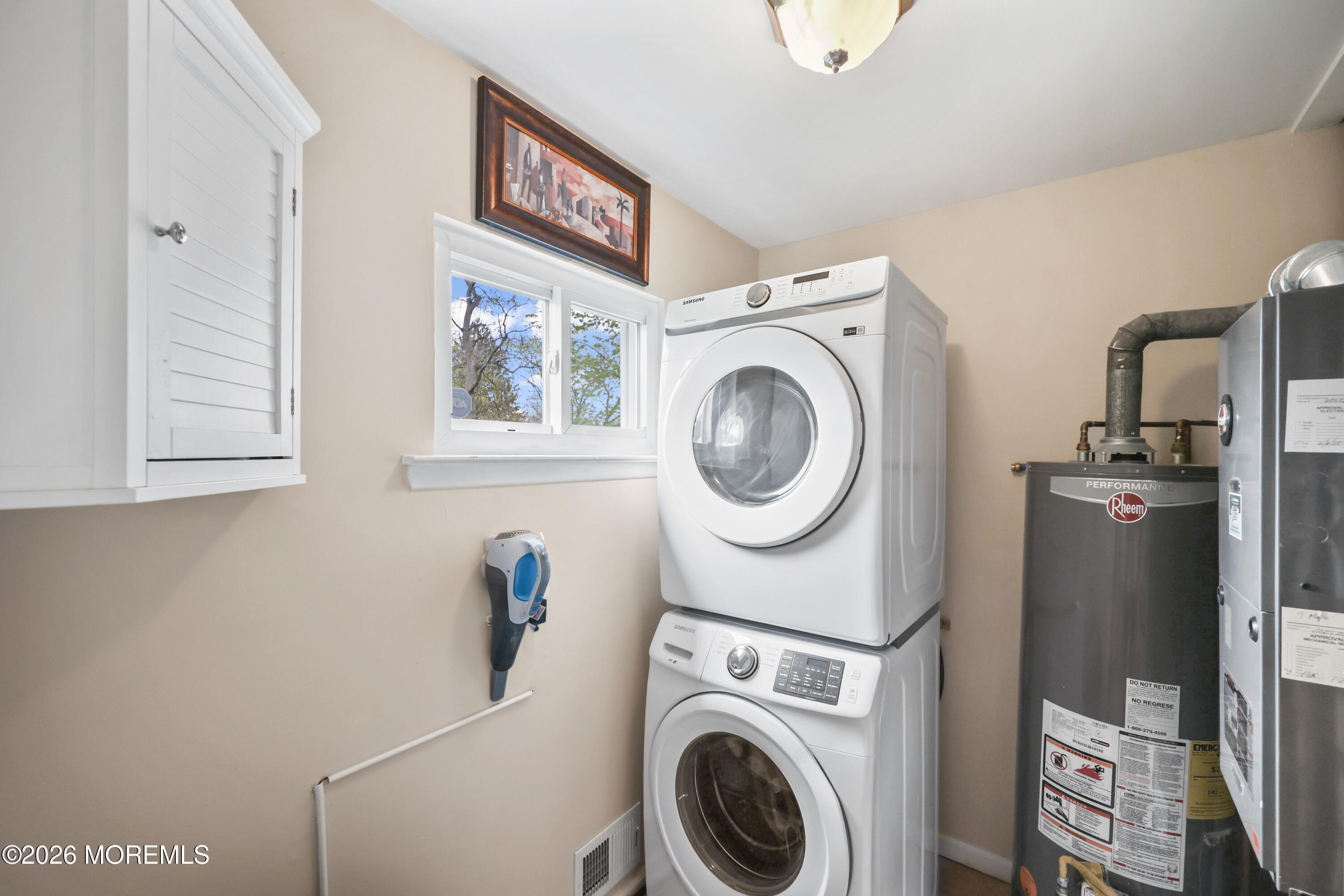 9 Maple Lane Howell, NJ 07731 - Photo 24 of 32 a utility room with dryer and washer