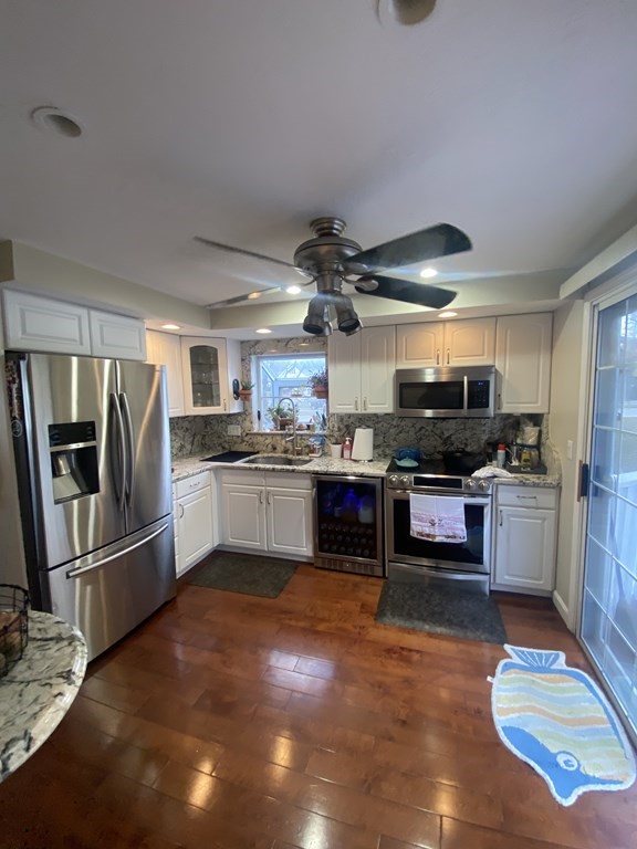 1 Jonathan Circle Worcester, MA 01604 - Photo 14 of 31 a kitchen with refrigerator and cabinets