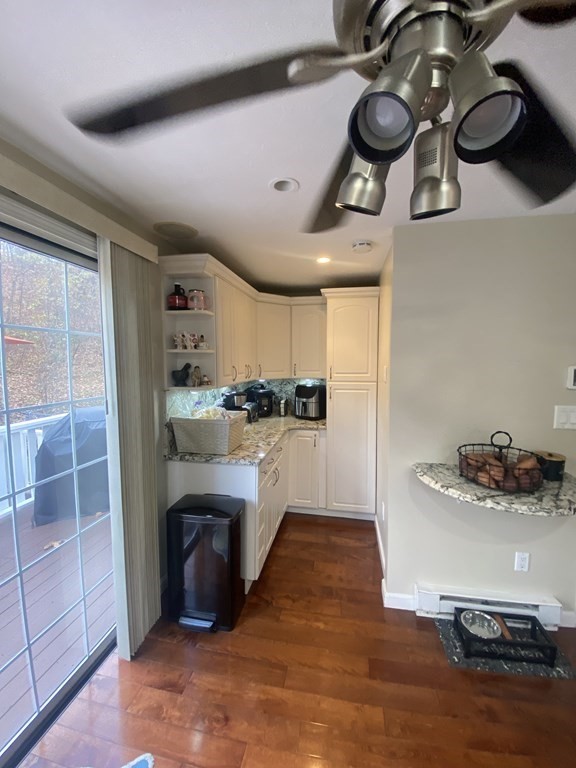 1 Jonathan Circle Worcester, MA 01604 - Photo 16 of 31 a kitchen with stainless steel appliances granite countertop a sink and cabinets