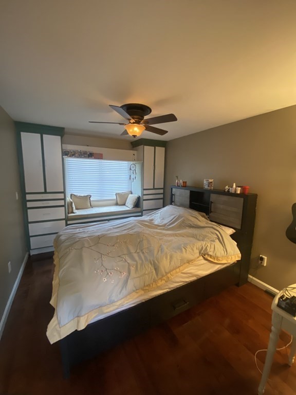 1 Jonathan Circle Worcester, MA 01604 - Photo 17 of 31 a bed sitting in a room next to a window