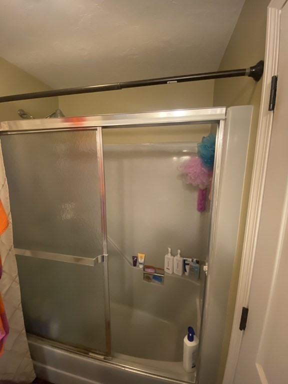 1 Jonathan Circle Worcester, MA 01604 - Photo 19 of 31 a bathroom with a glass shower door