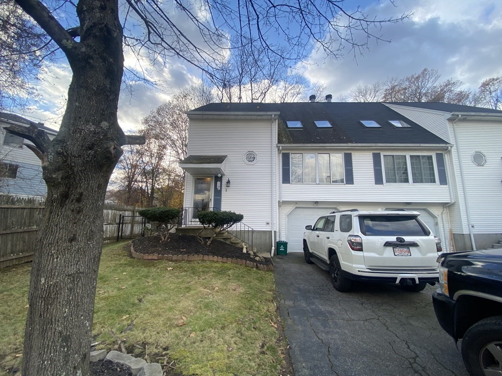 1 Jonathan Circle Worcester, MA 01604 - Photo 2 of 31 a view of a couches in the patio with a barbeque