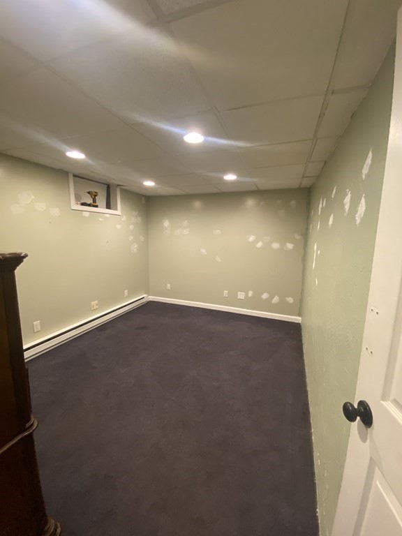 1 Jonathan Circle Worcester, MA 01604 - Photo 30 of 31 an empty room with a wooden floor and windows