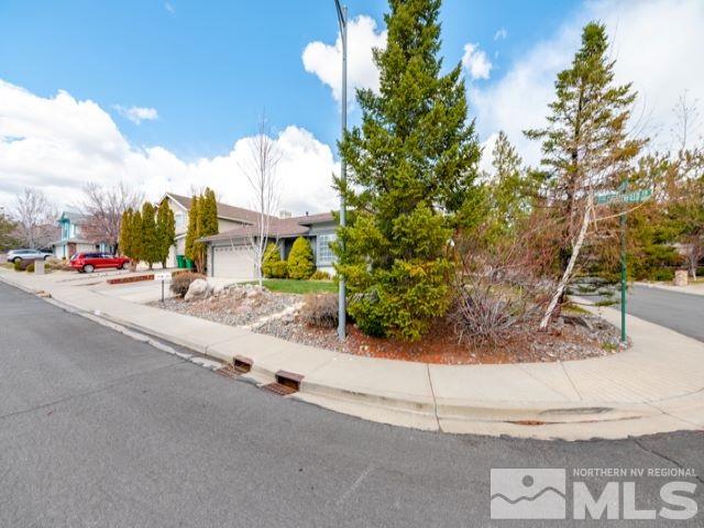 6837 Chesterfield Lane Reno, NV 89523 - Photo 3 of 24 a view of a street with houses
