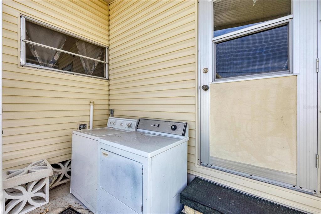 4114 10th St Court East Ellenton, FL 34222 - Photo 19 of 44 a utility room with dryer and washer