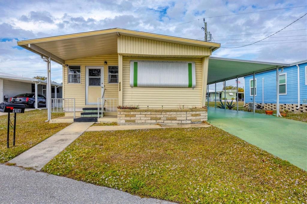 4114 10th St Court East Ellenton, FL 34222 - Photo 21 of 44 a view of a house with swimming pool