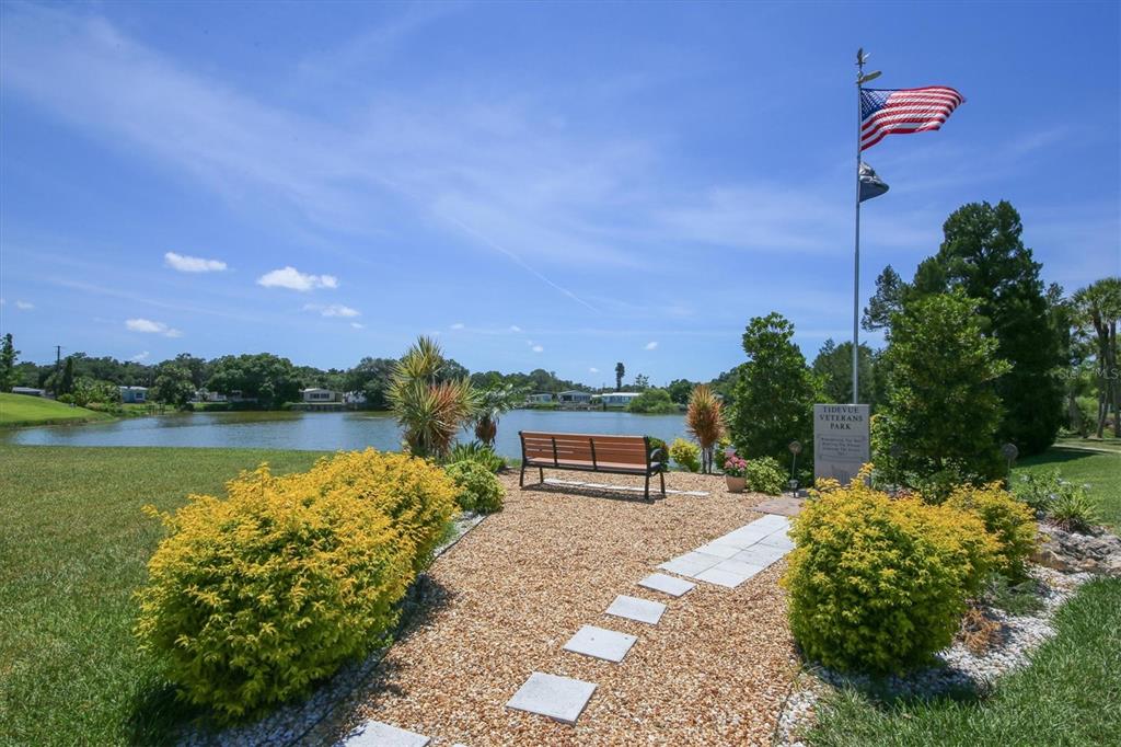 4114 10th St Court East Ellenton, FL 34222 - Photo 42 of 44 a view of a pathway with a lake view