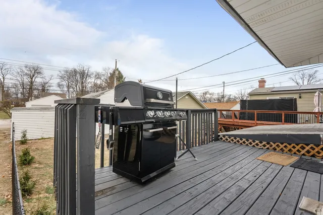 a view of a balcony with furniture