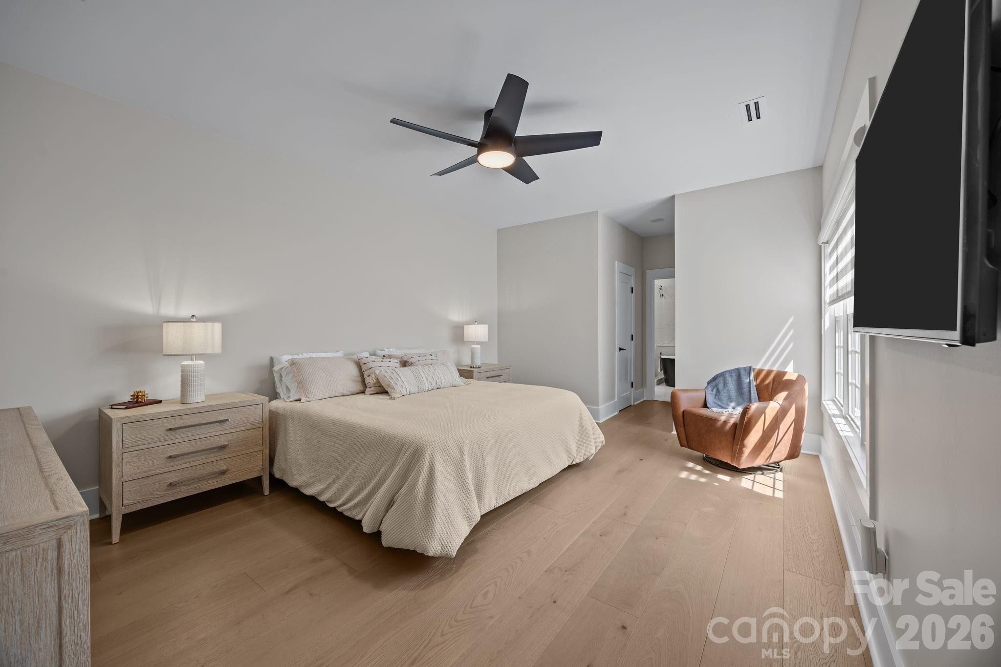 241 North Faulkner Way Davidson, NC 28036 - Photo 18 of 39 a bedroom with bed and window