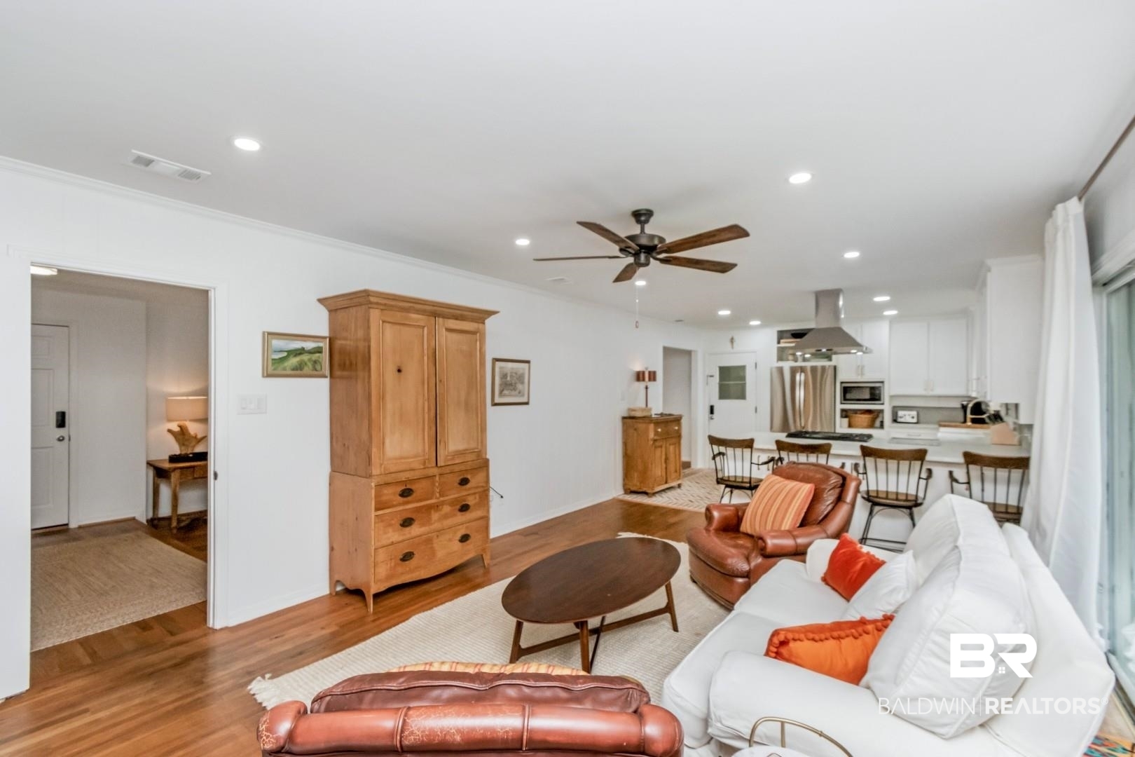 4596 Hawthorne Place Mobile, AL 36608 - Photo 22 of 34 Open-concept living area featuring wood-finish flooring, recessed lighting, and a ceiling fan