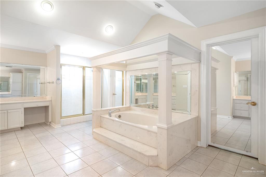 3814 B Shea Weslaco, TX 78596 - Photo 31 of 43 a large white tub sitting in a room next to a window