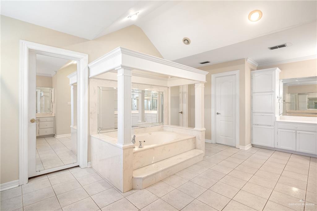 3814 B Shea Weslaco, TX 78596 - Photo 32 of 43 a spacious bathroom with a tub shower and sink