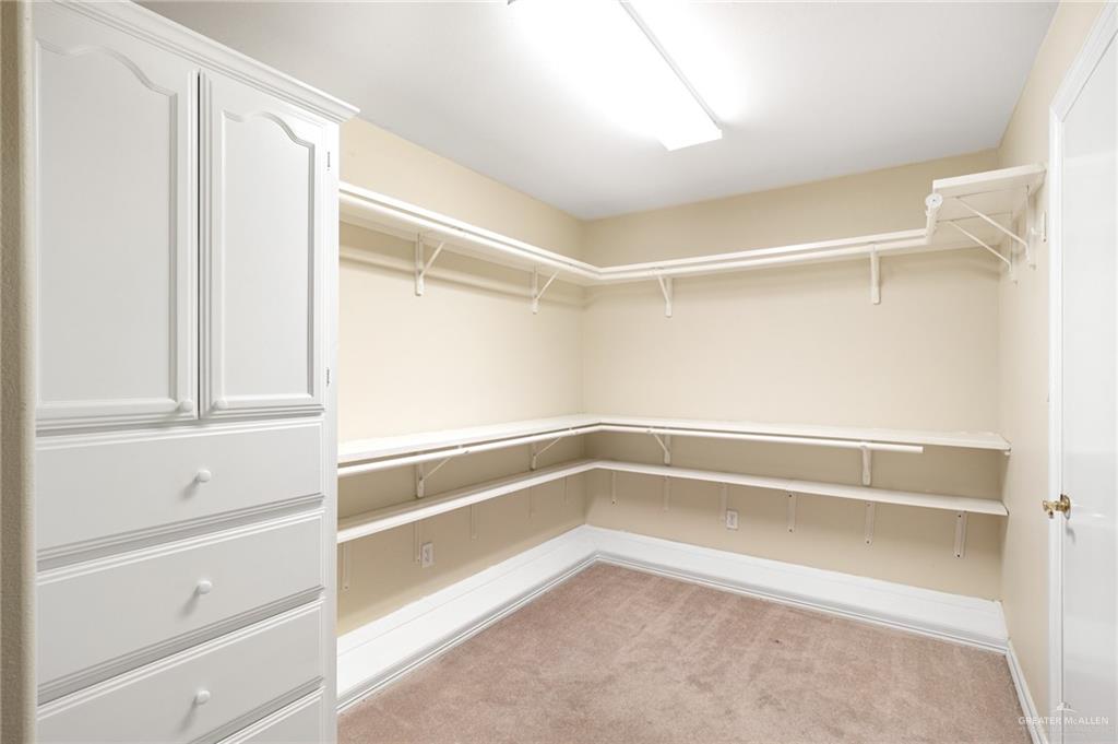 3814 B Shea Weslaco, TX 78596 - Photo 35 of 43 a view of an empty walk in closet