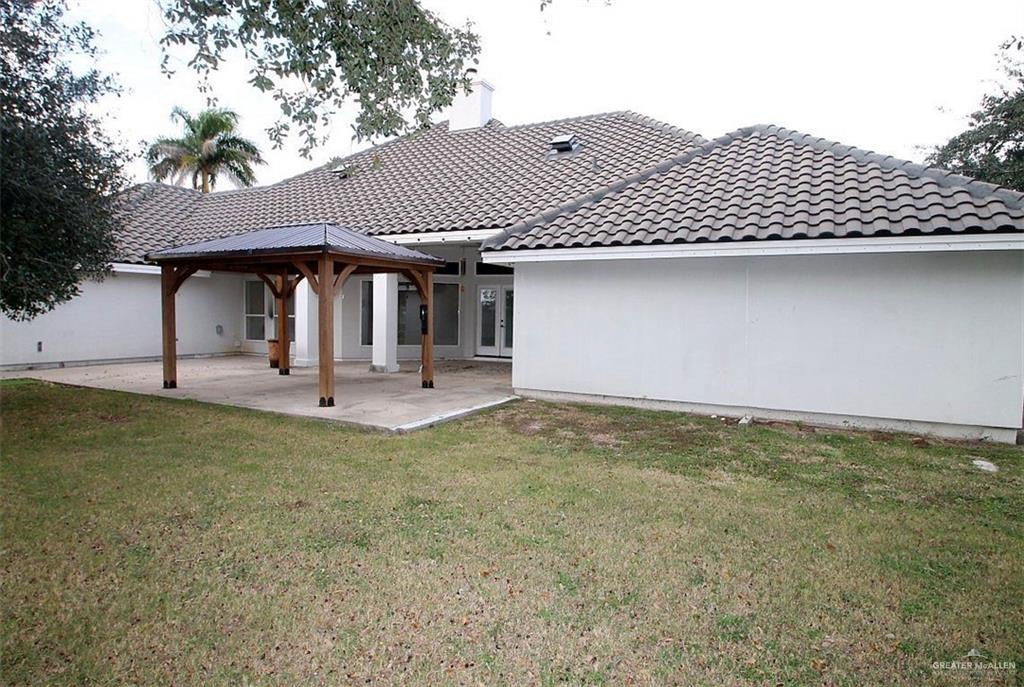 3814 B Shea Weslaco, TX 78596 - Photo 37 of 43 a front view of a house with a yard